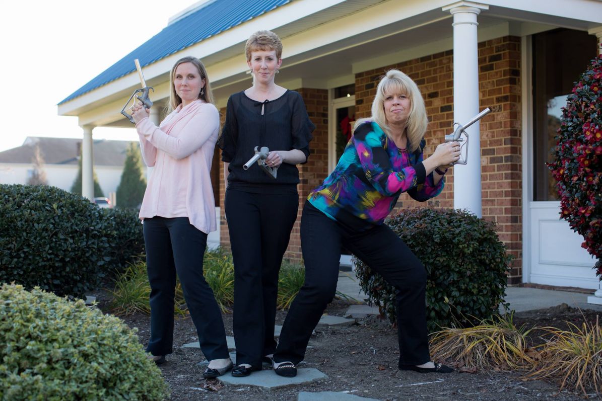 Ladies of Phillips Energy with Gas Pumps.jpg